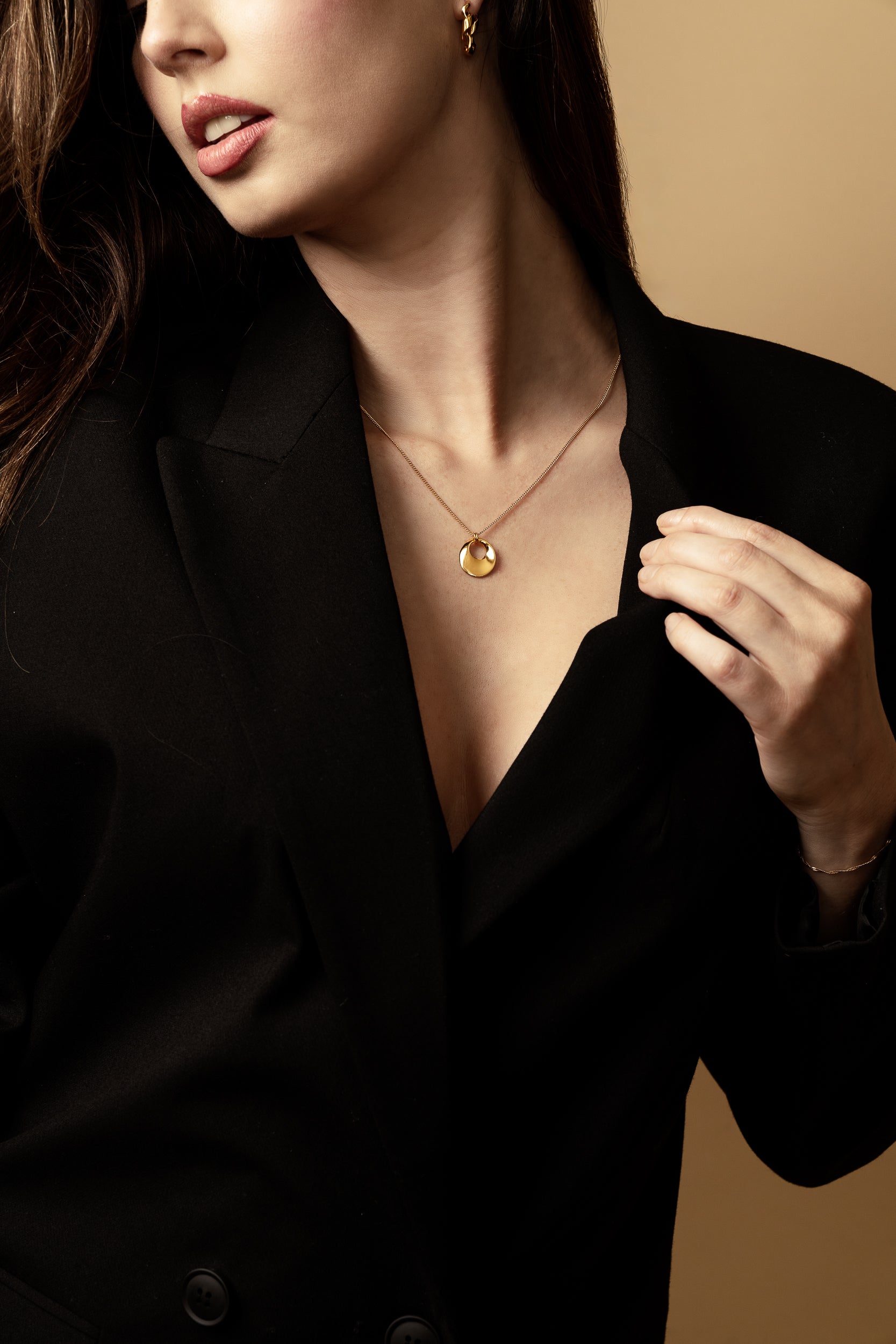 woman wearing black and gold blazor and pendant necklace 18K gold vermeil necklace